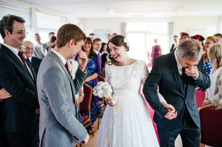 emotional bride meets groom at altar