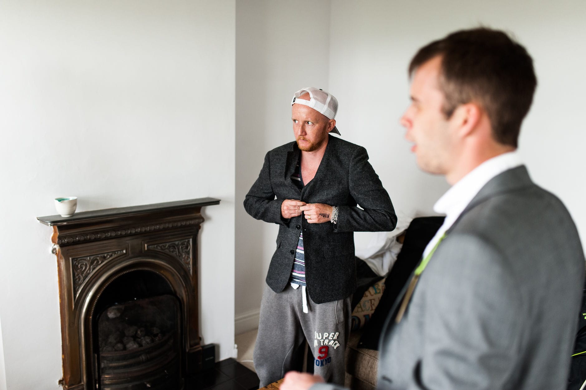 baseball cap suit jacket wedding morning