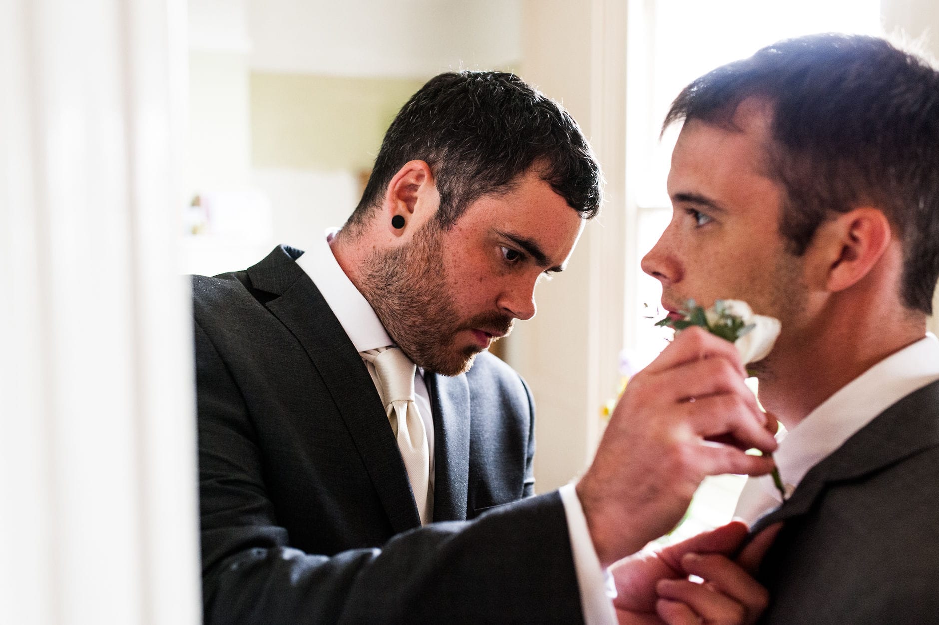 groom fitting flowers