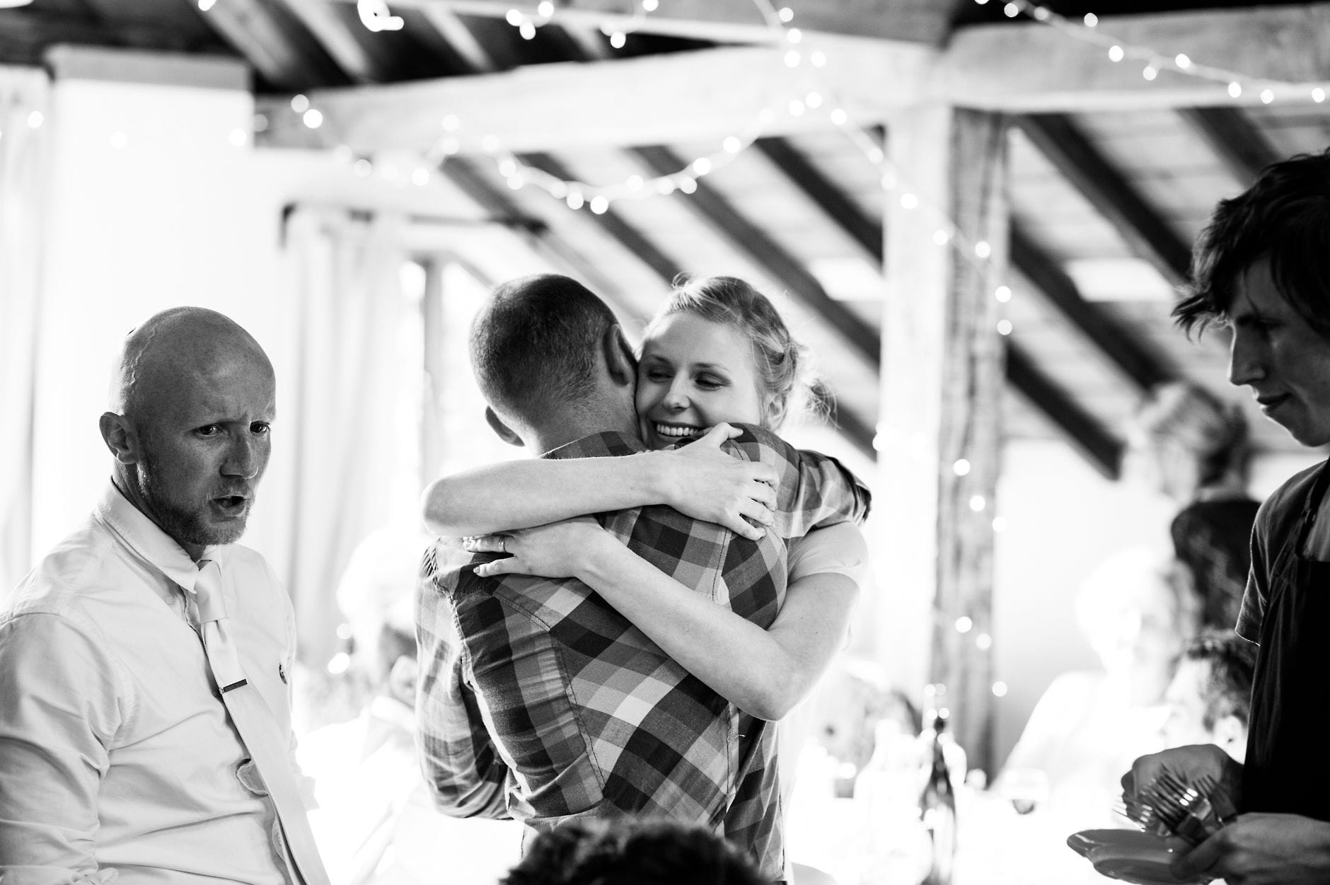 bride hugging guest