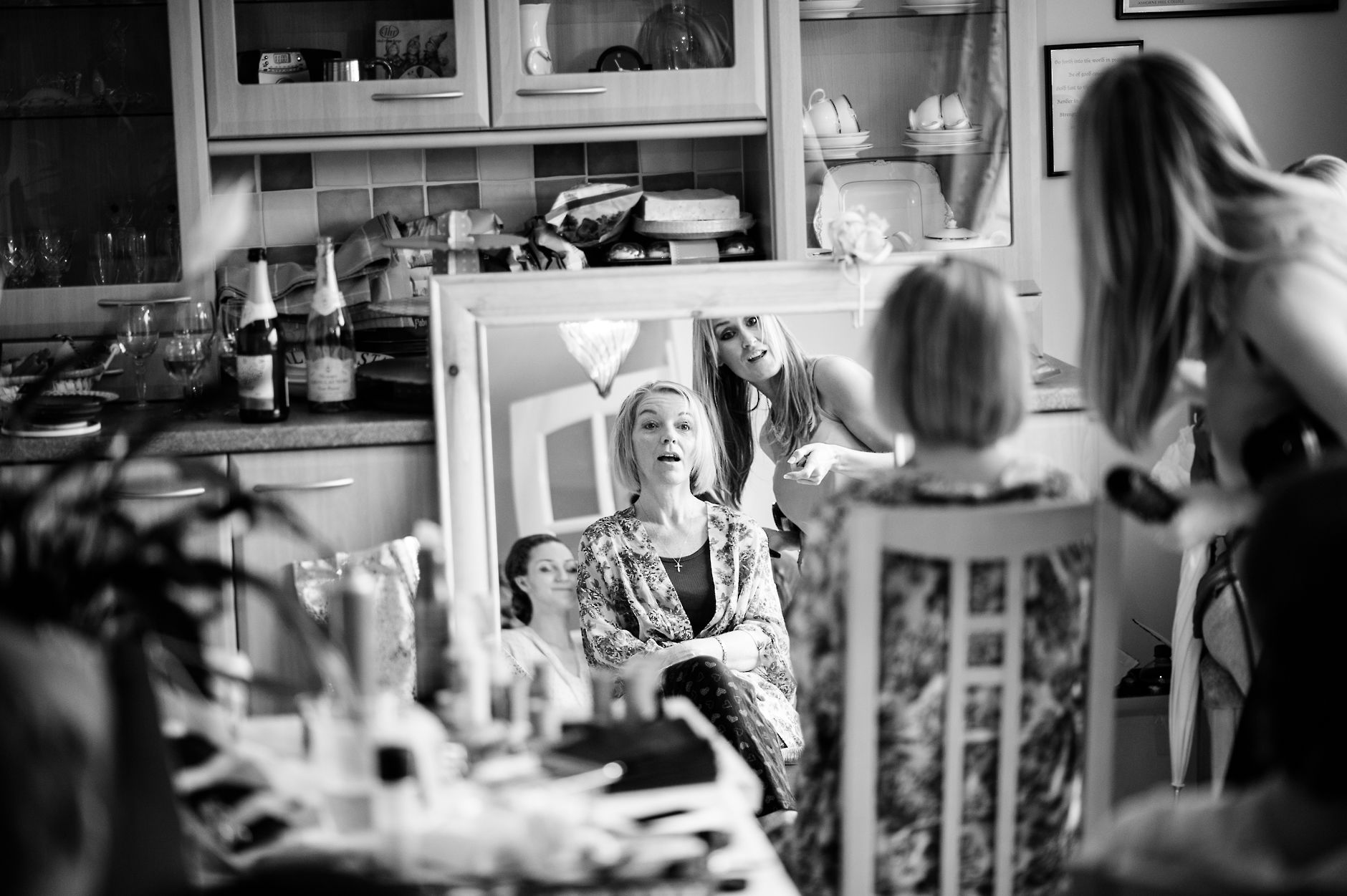 Mother of the bride having make up done