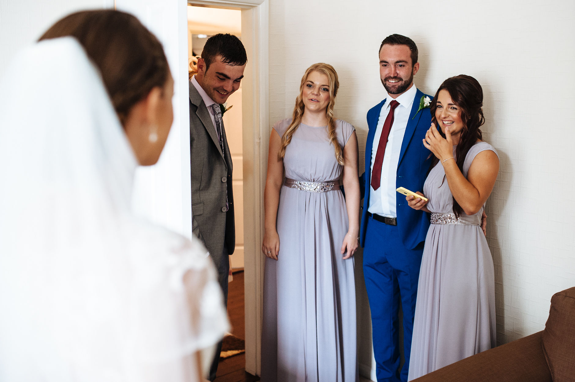 Bride's family see her in her dress for the first time