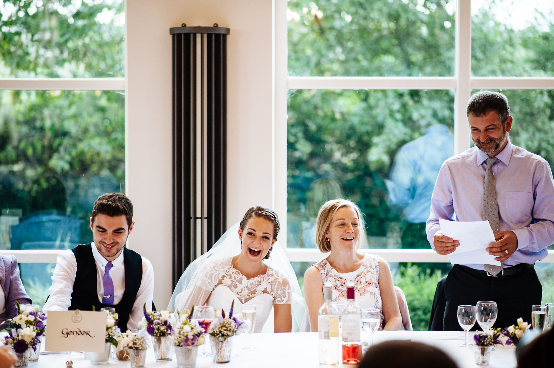 Laughing during wedding speeches
