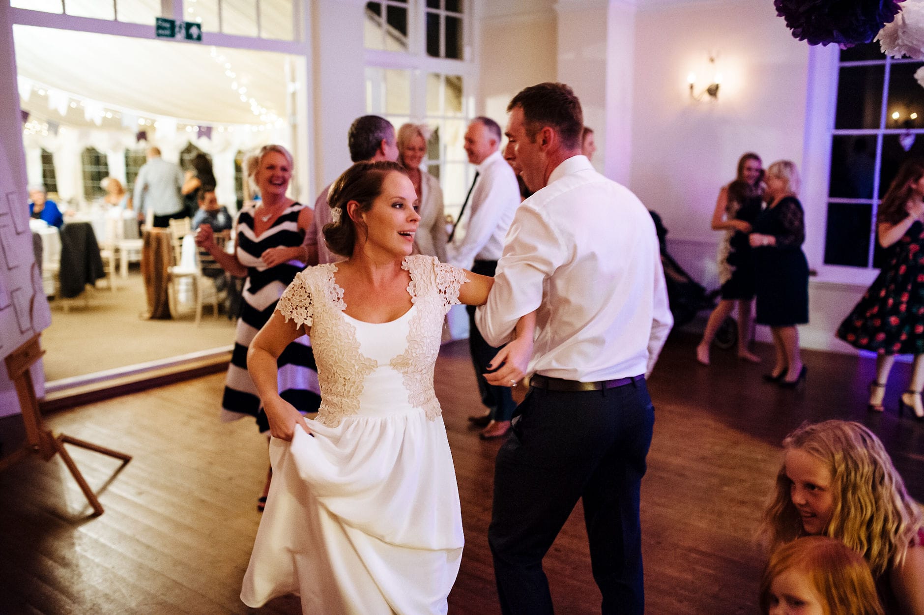 Bride and groom dancing Ceilidh