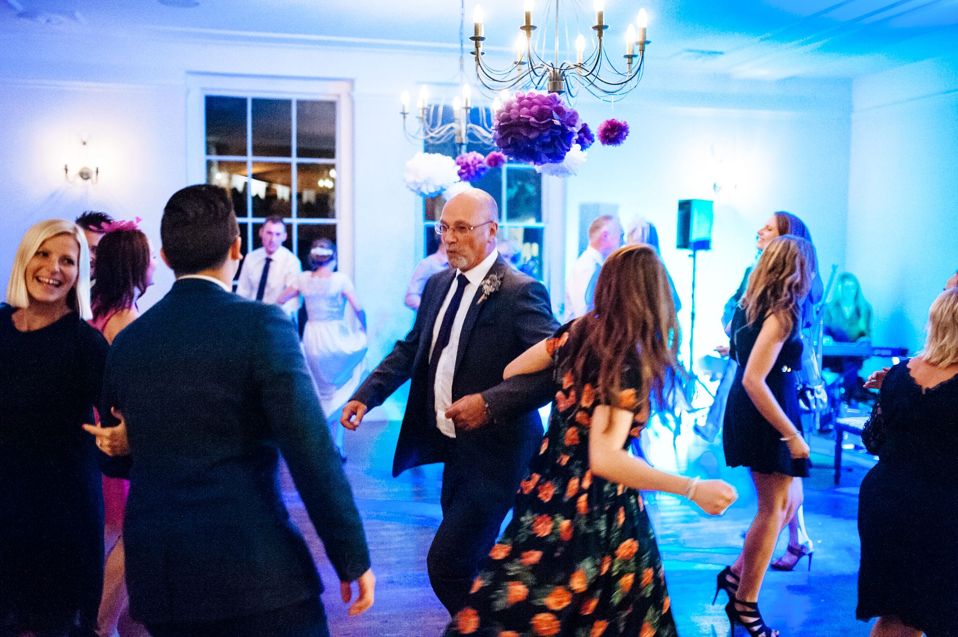 ceilidh wedding guests dancing