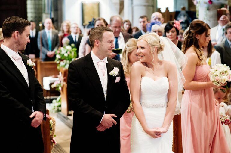 Smiling bride arrives at church