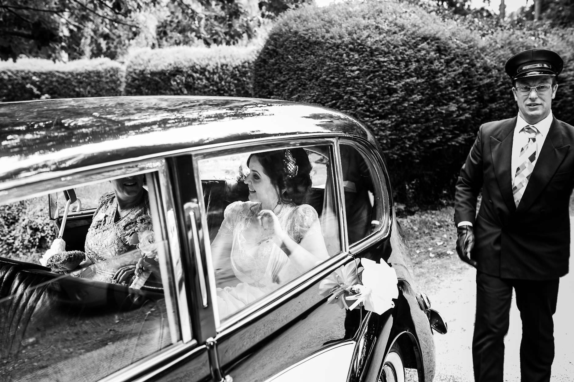 bride arrives in wedding car