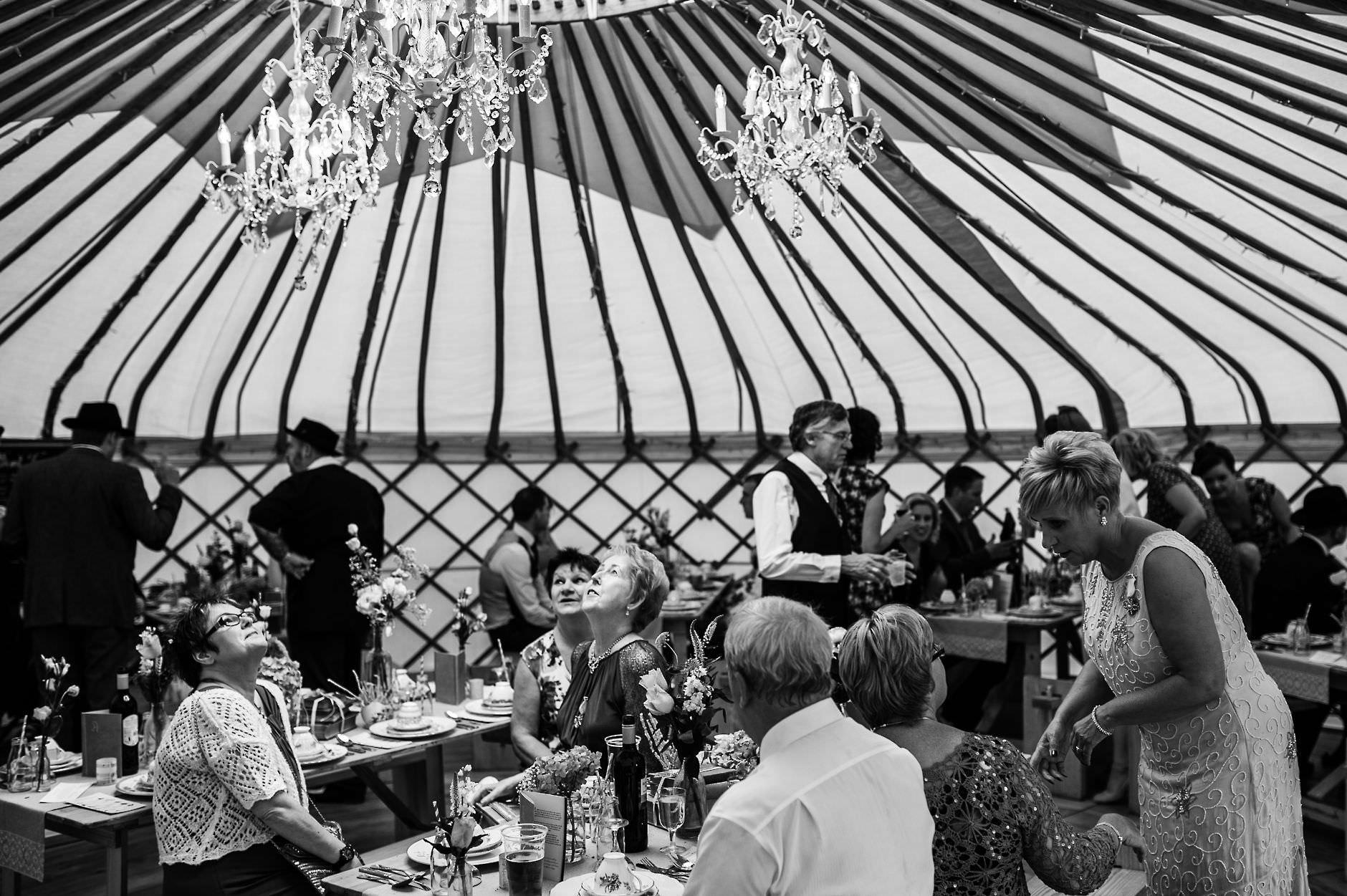 guests admiring the yurt's interior