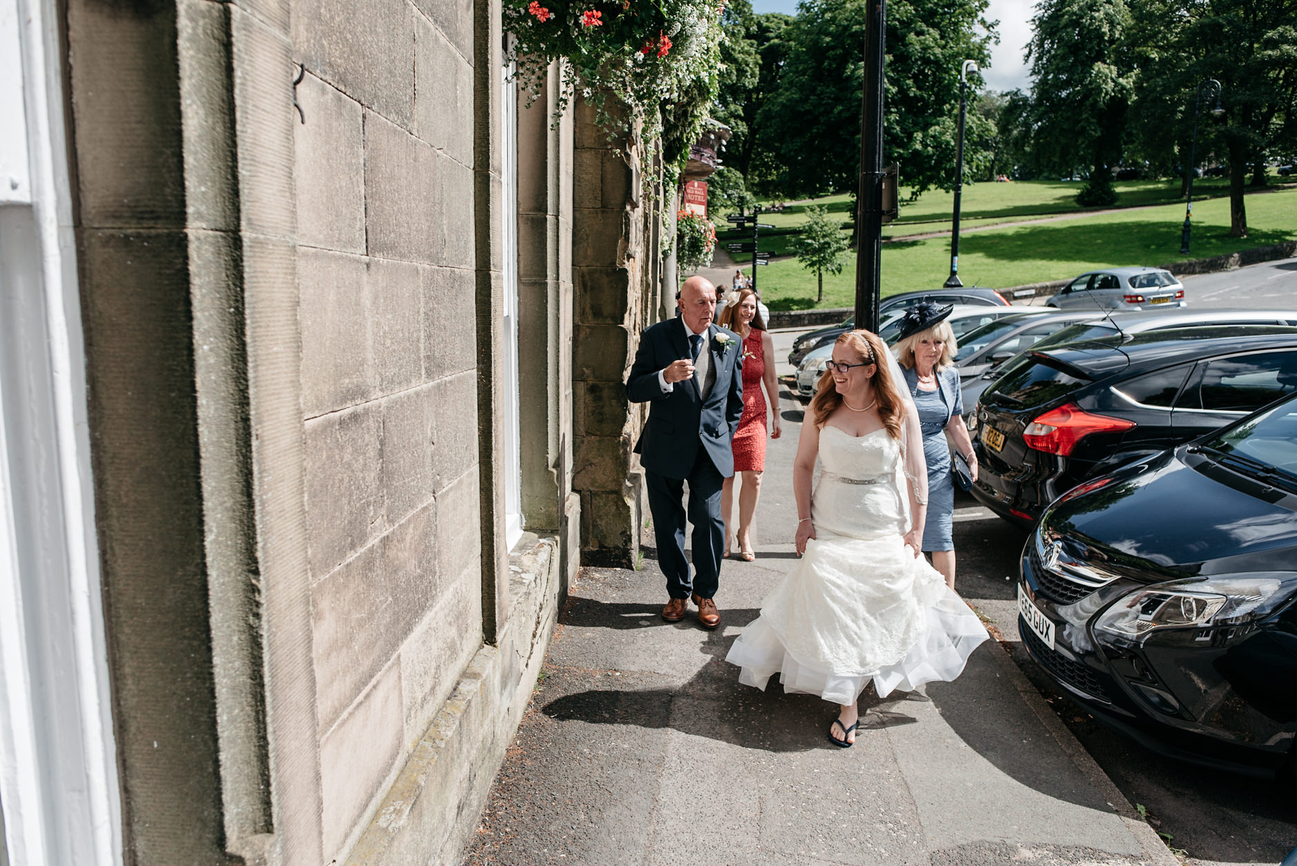 bride walking to the wedding venue in buxton
