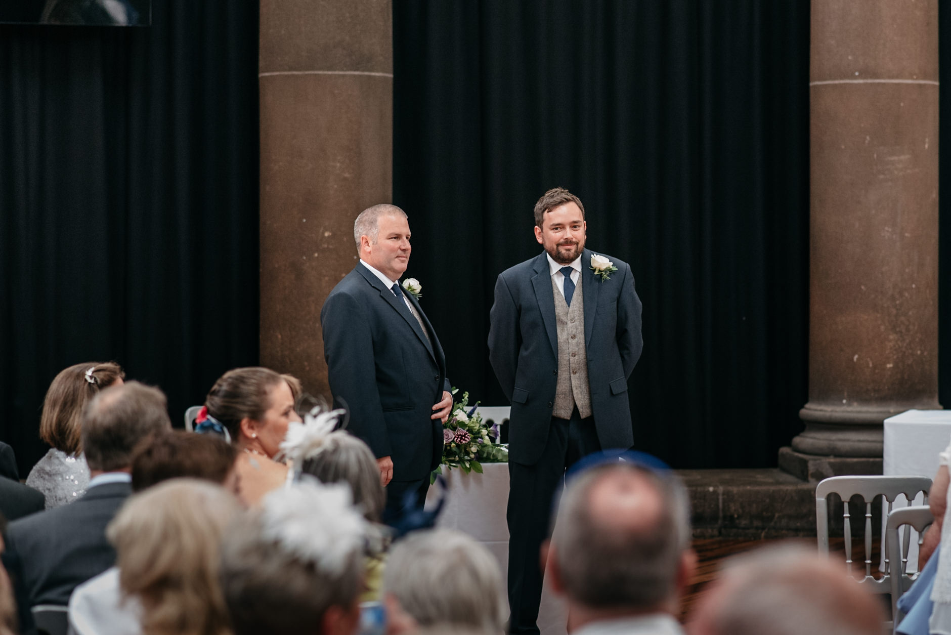 groom waiting patiently with best man