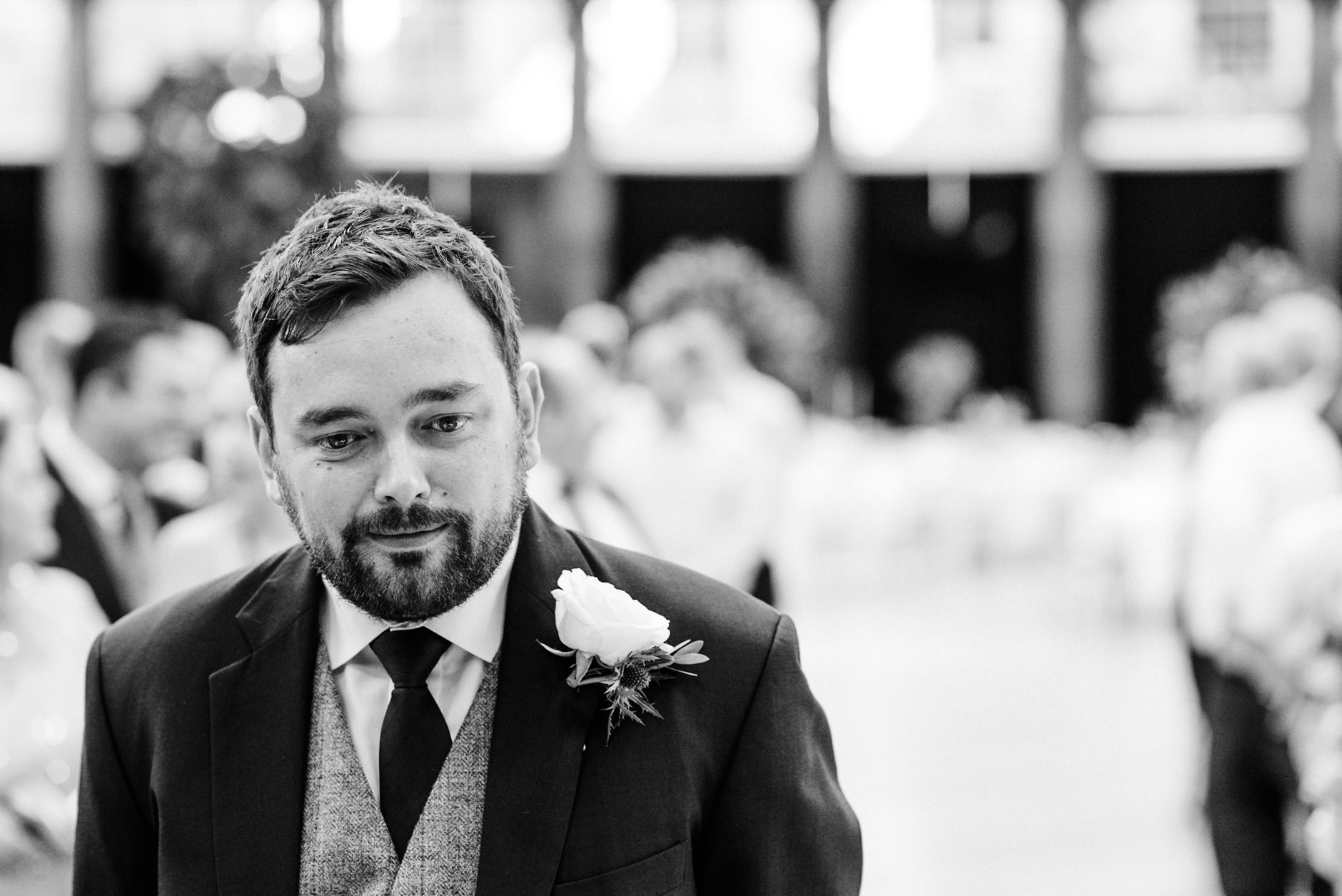 pensive groom waiting for the bride
