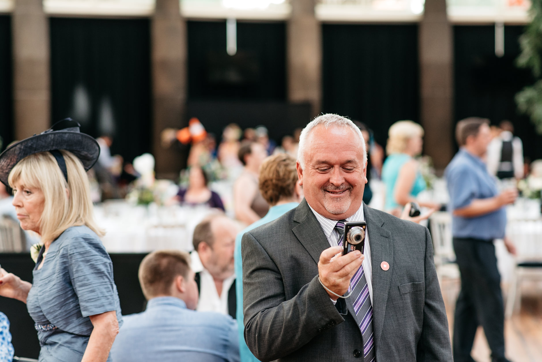 happy guest taking photos