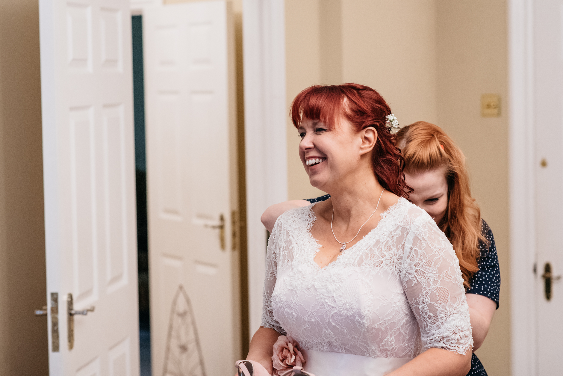 bride laughing during bridal prep