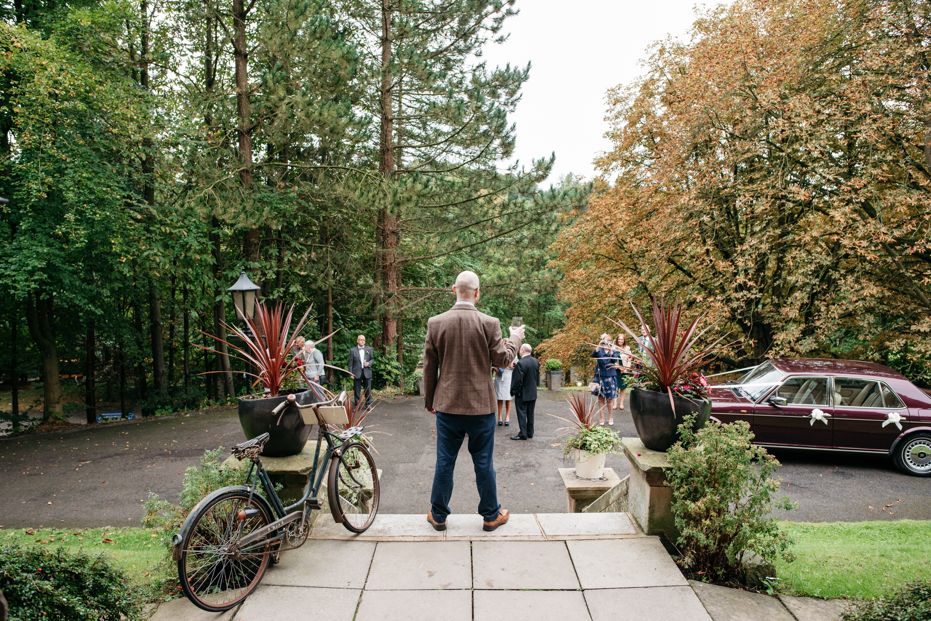 wedding guest posing on the steps