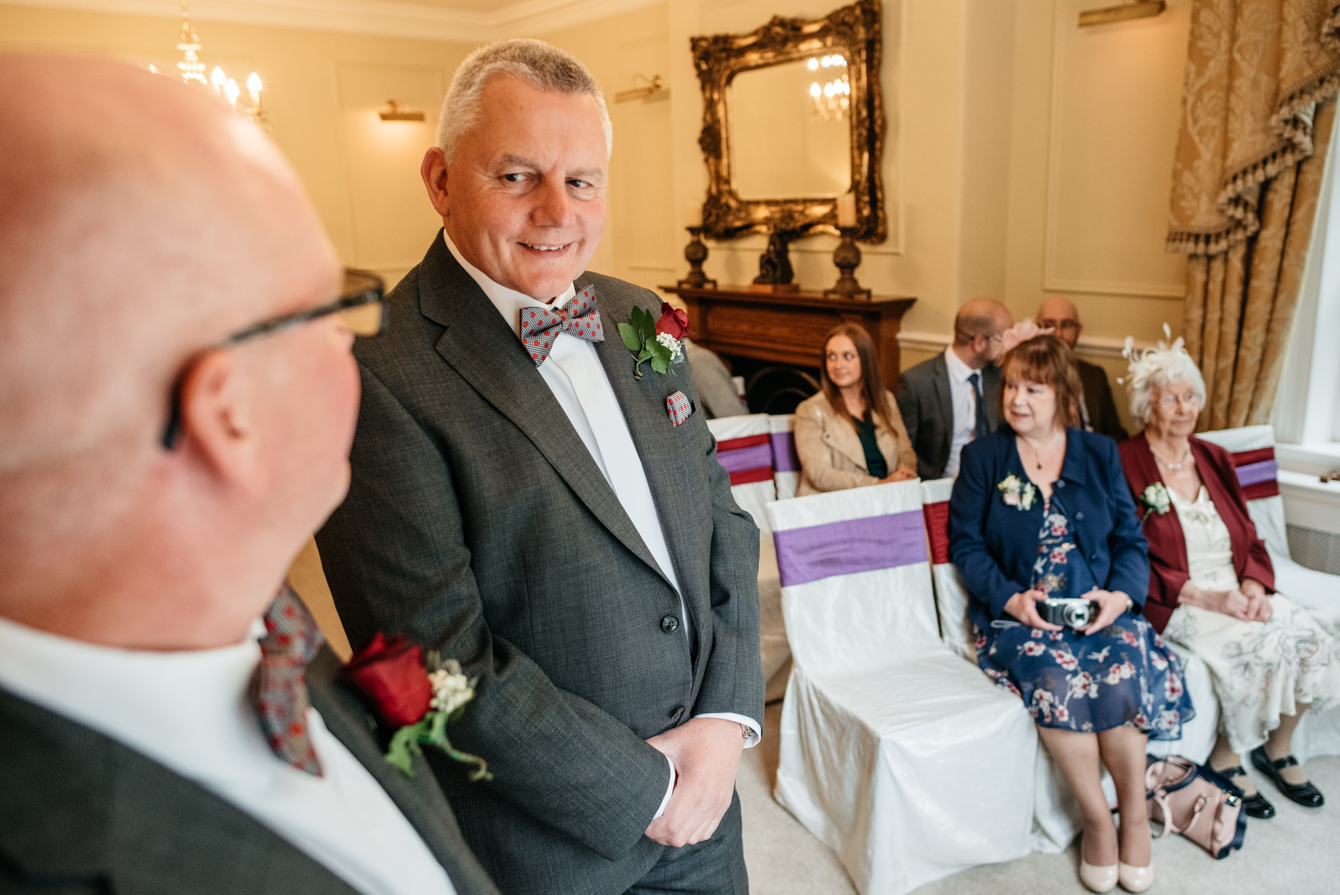 groom standing with his best man