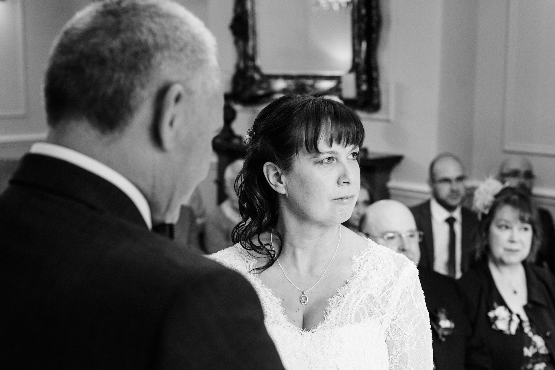 bride listening to the readings during the ceremony