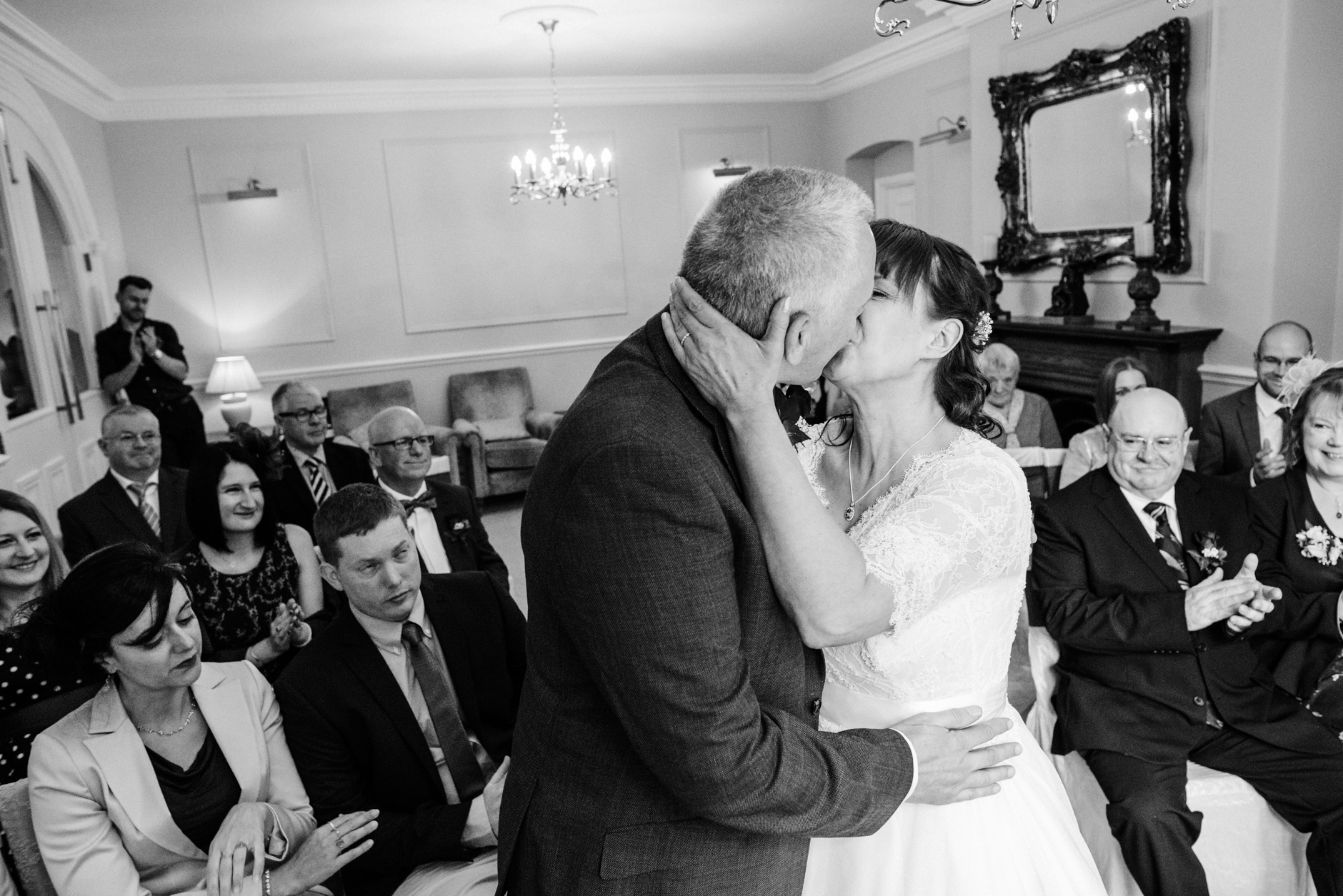 bride and groom first kiss