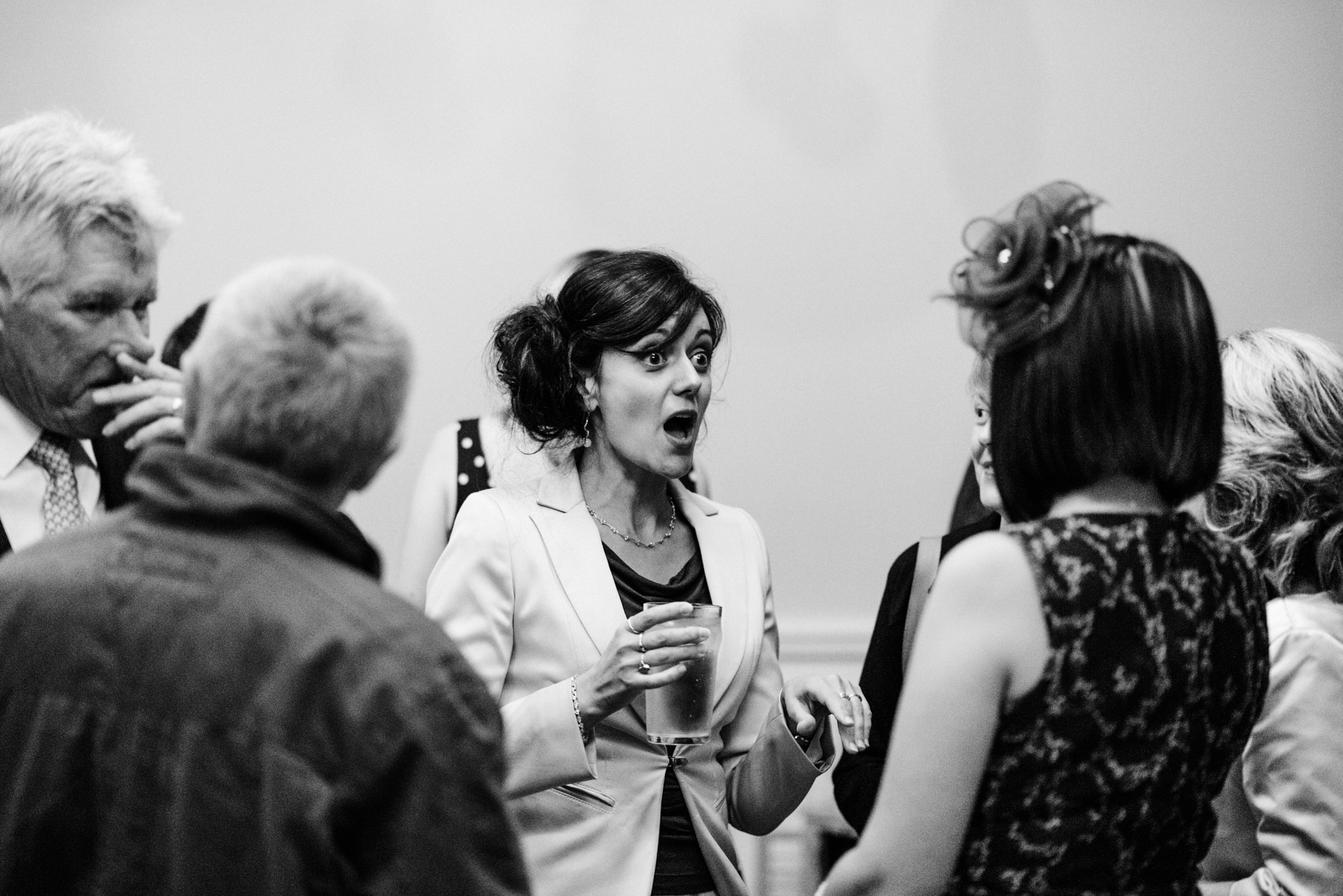 lady pulls a shocked face whilst chatting