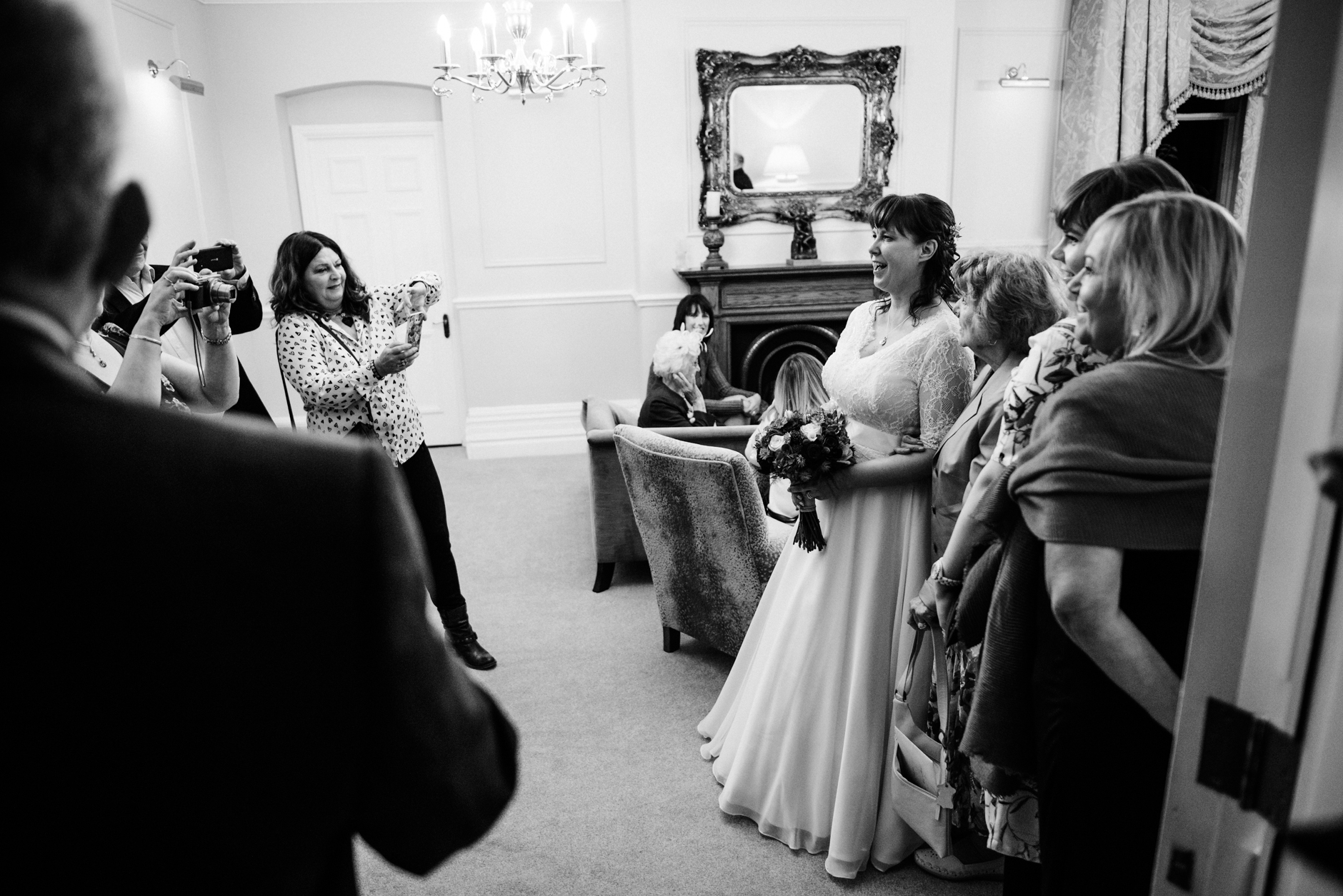 bride and friends posing for photos