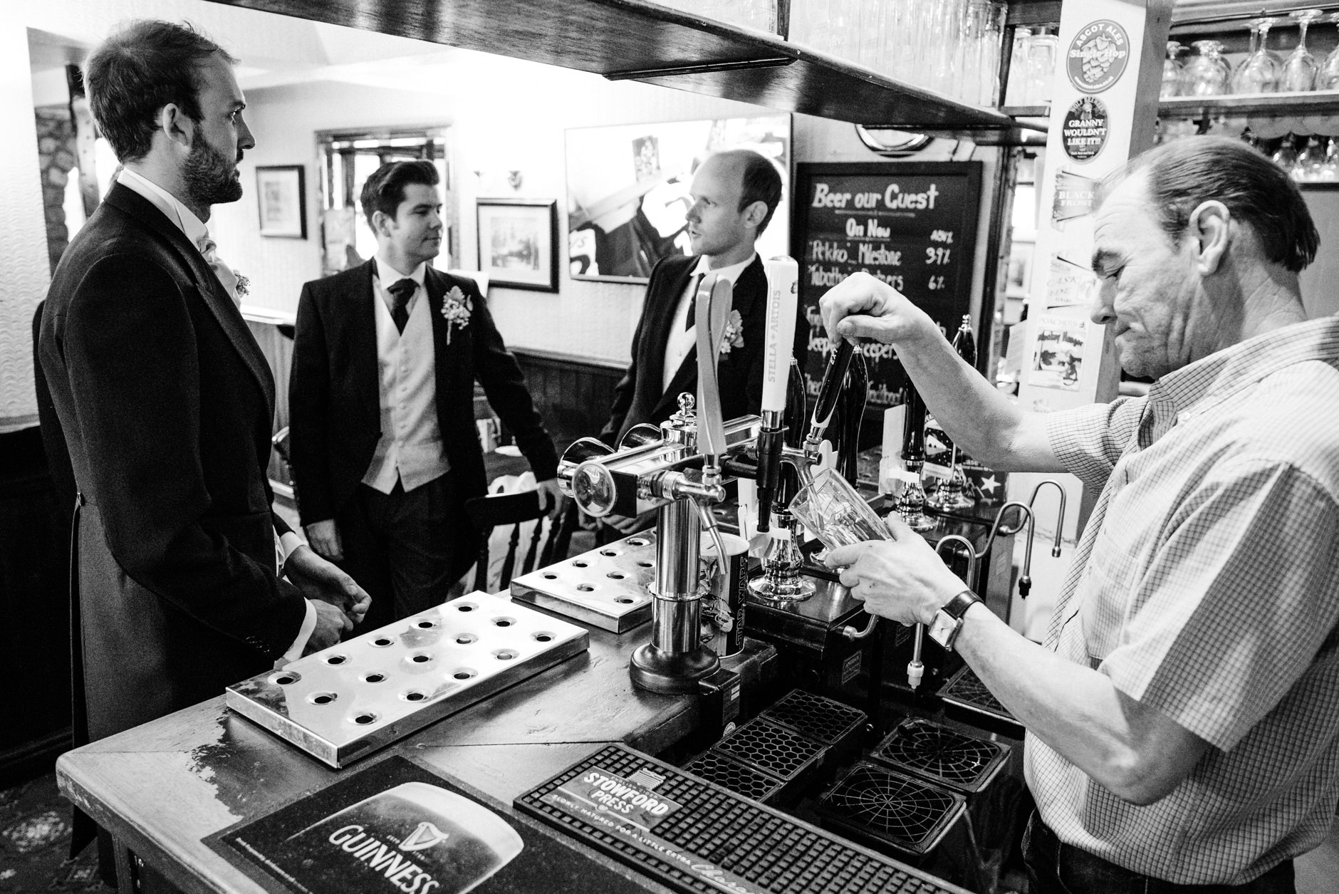 Groom having a drink in the pub before the ceremony