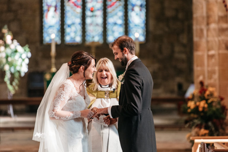 Melbourne church wedding with the bride struggling to put on the ring