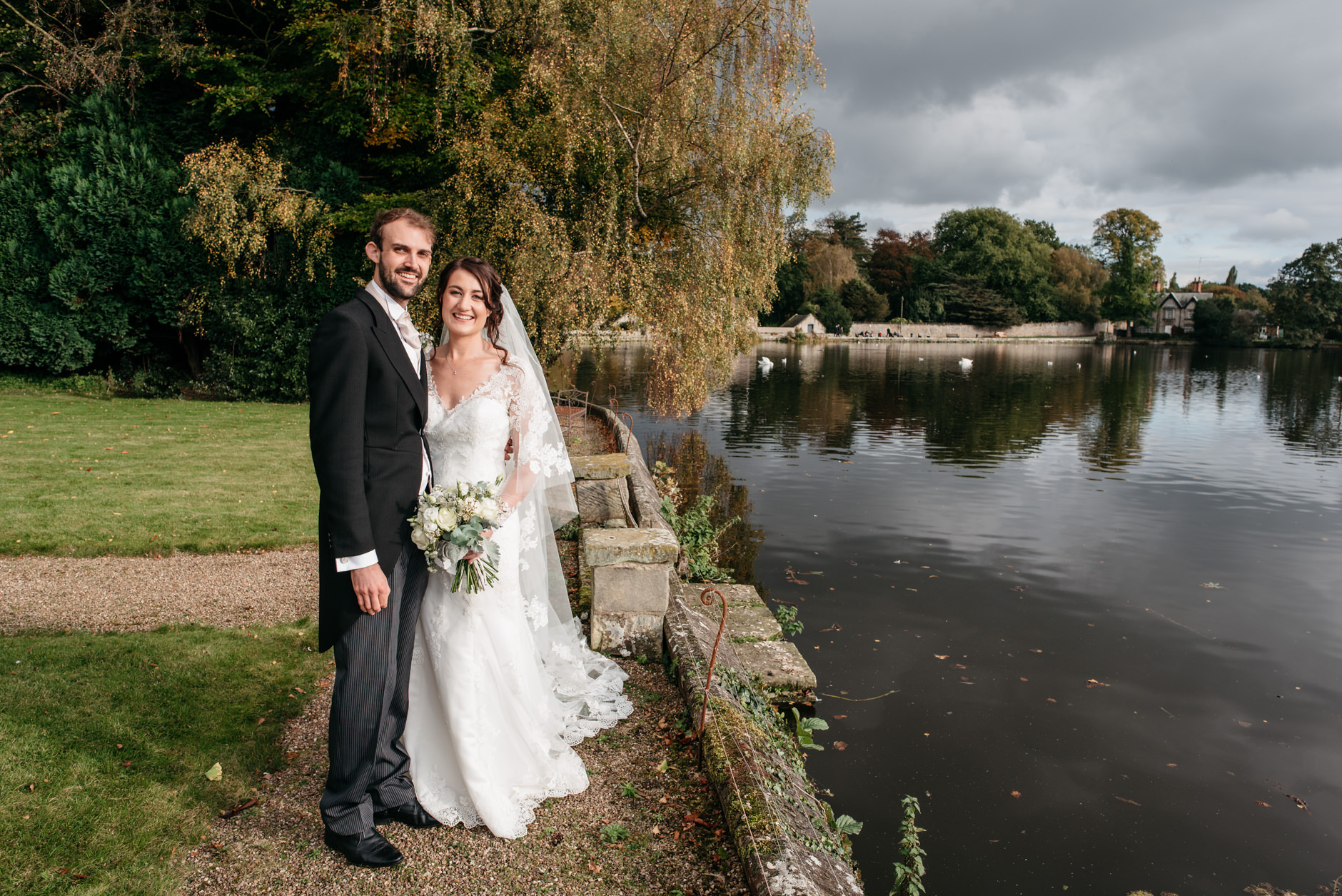 Relaxed wedding portrait at Melbourne Pool in Derbyshire