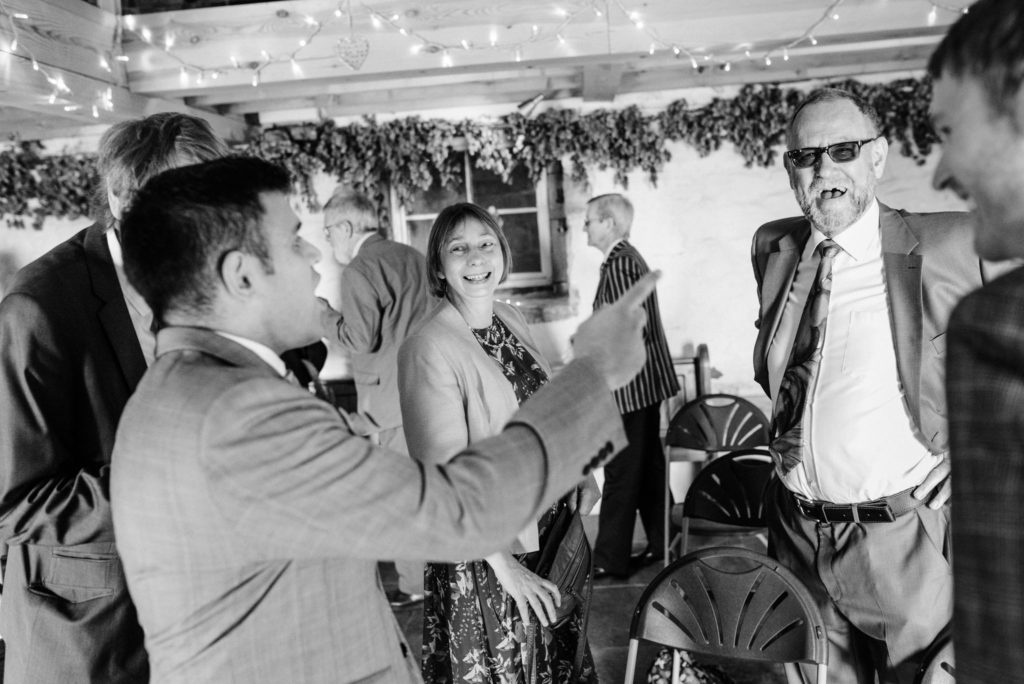 guests laughing before the ceremony