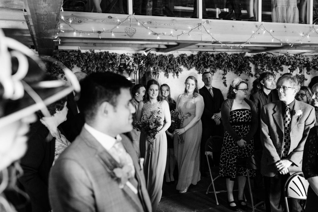 bridesmaids walking down the aisle