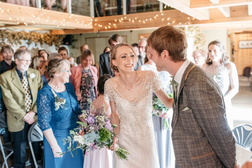 bride smiling at her new husband