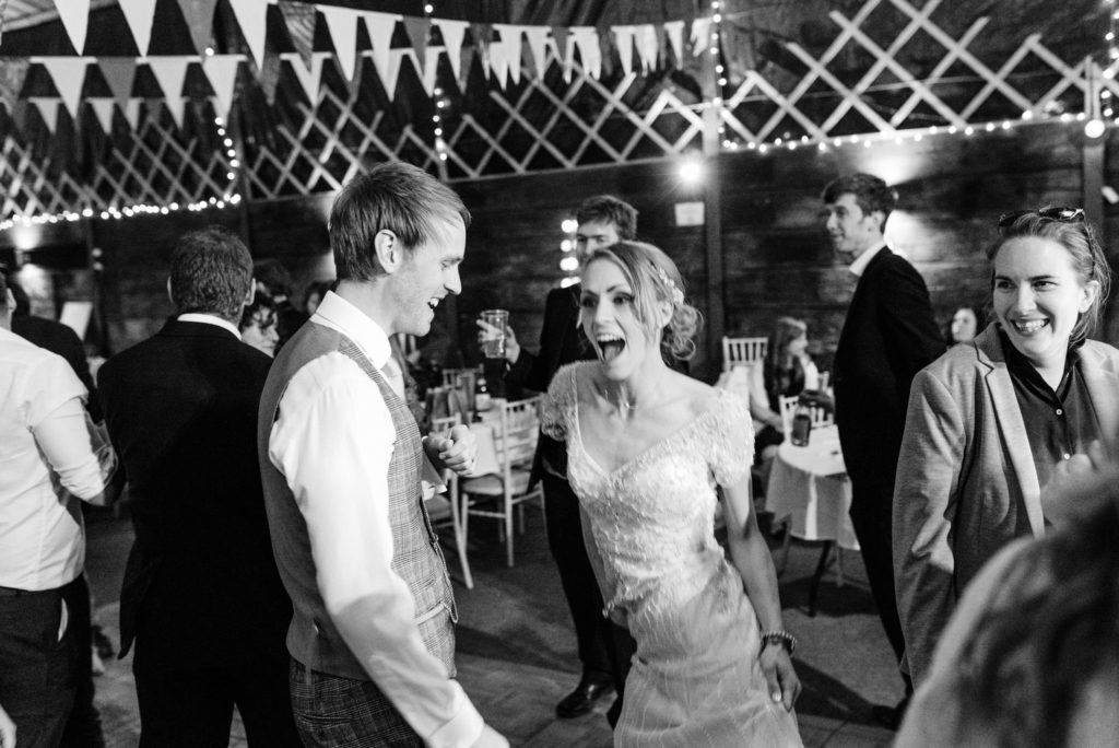 excited bride on the dance floor