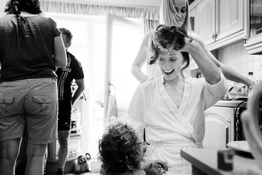 bride smiling at her daughter