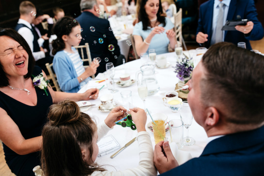 blowing bubbles at the tables