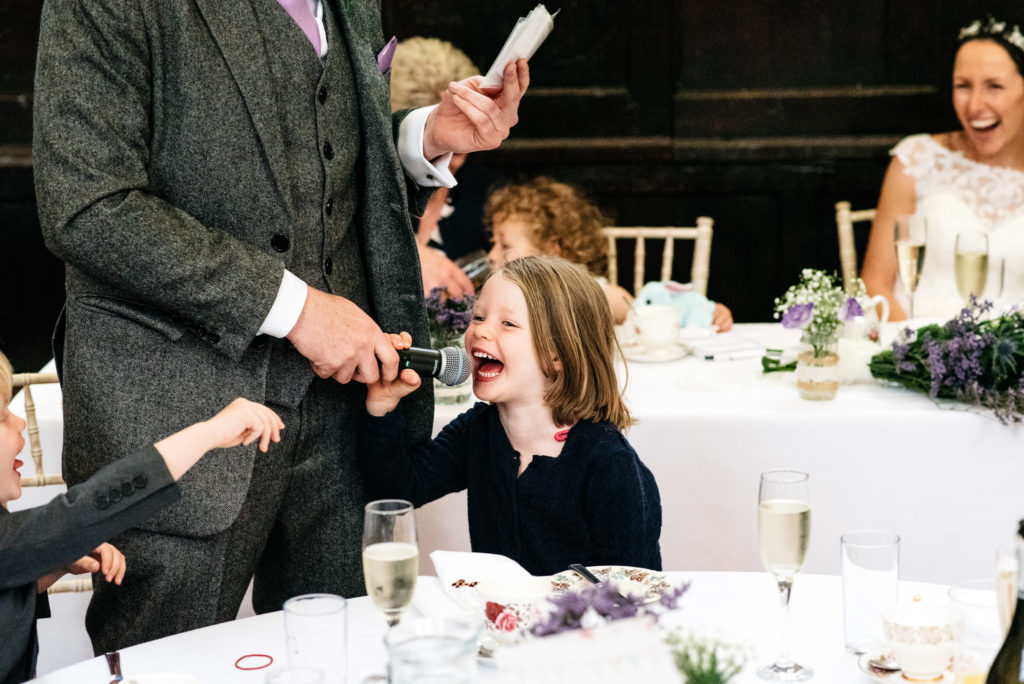 young guest grabbing the mic for speech