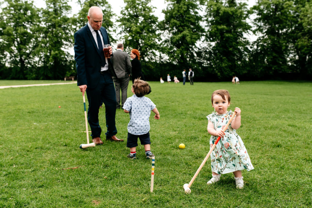 playing croquet on the lawn