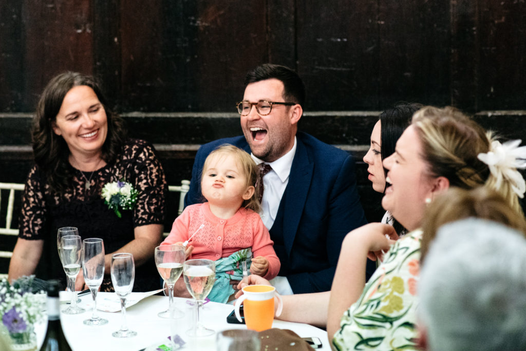 little girl blowing bubbles