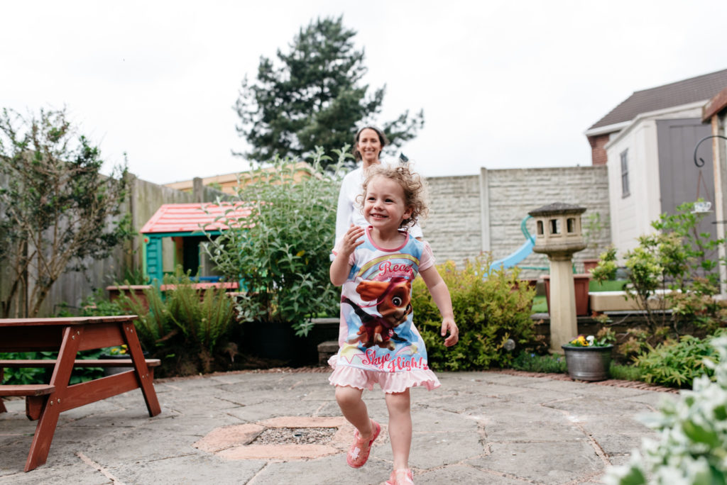 bride playing with her daughter