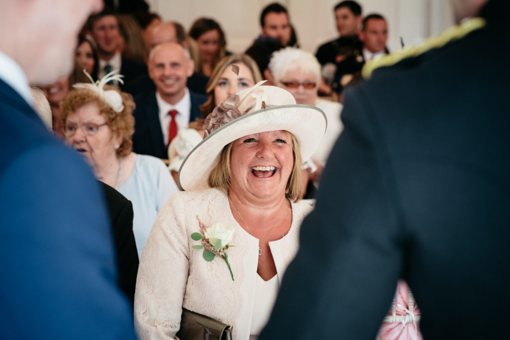 mother of the groom laughing