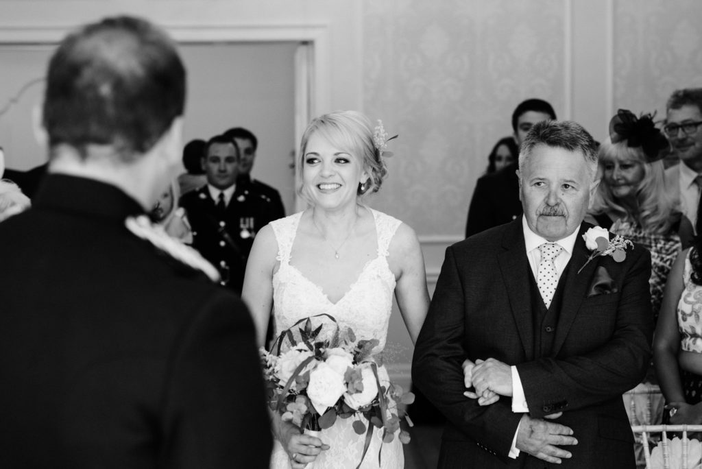 walking down the aisle with her father