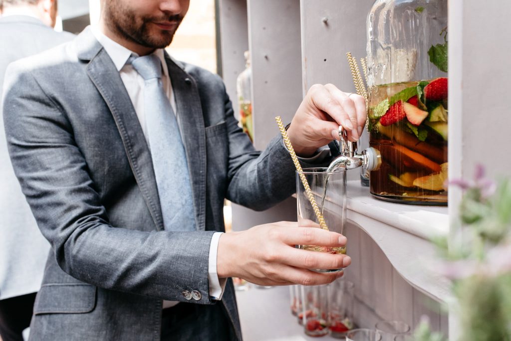guest helping himself to a drink