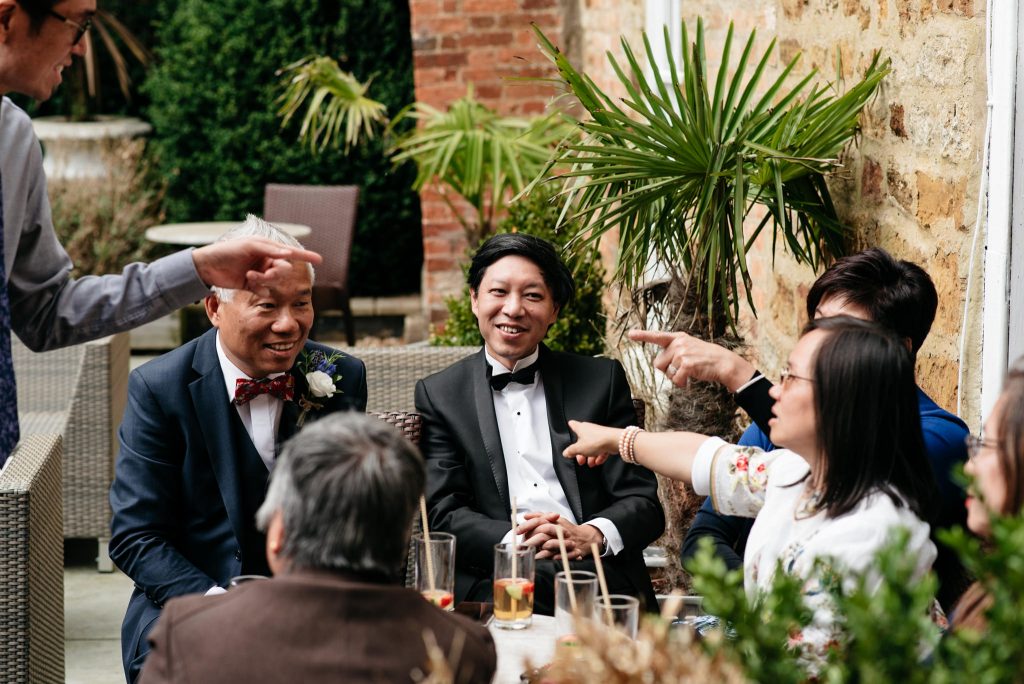 guests all pointing at guest