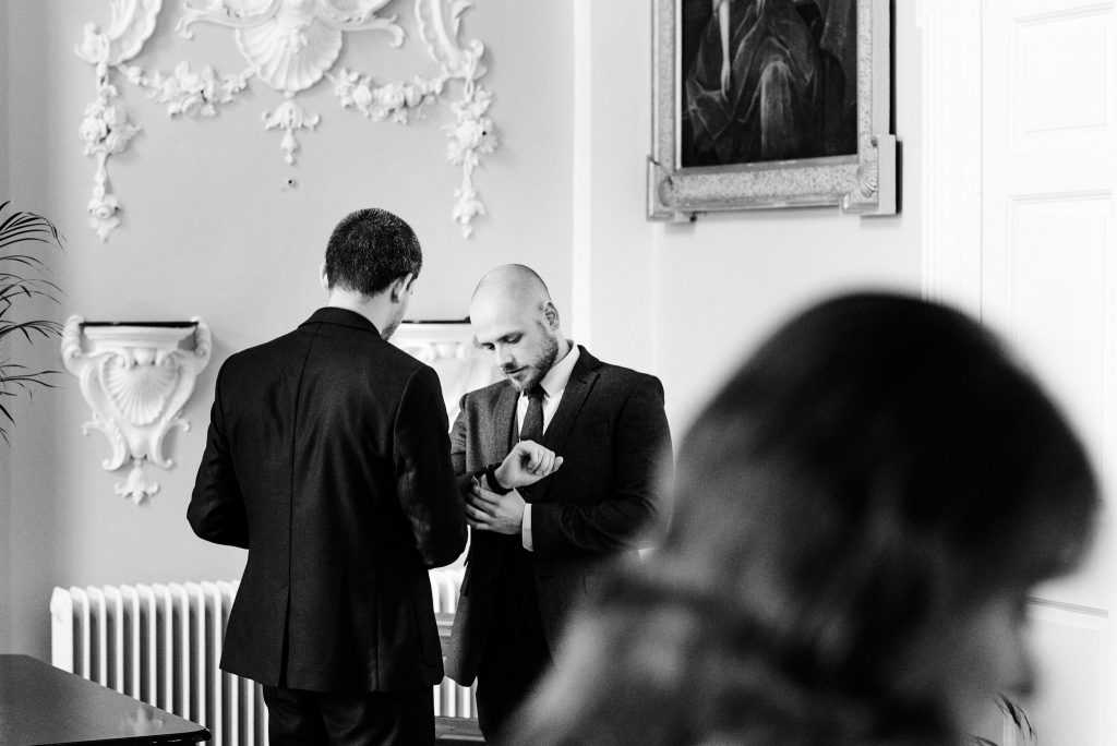 best man checking watch