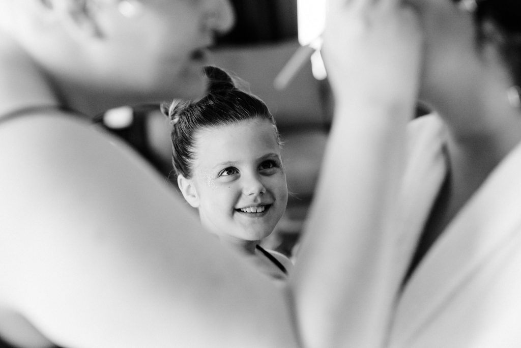 young flower girl smiling