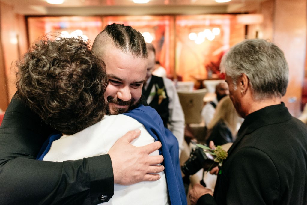 groom hugging his mother