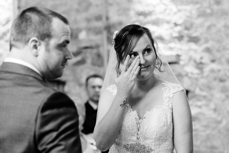 bride wiping away a tear
