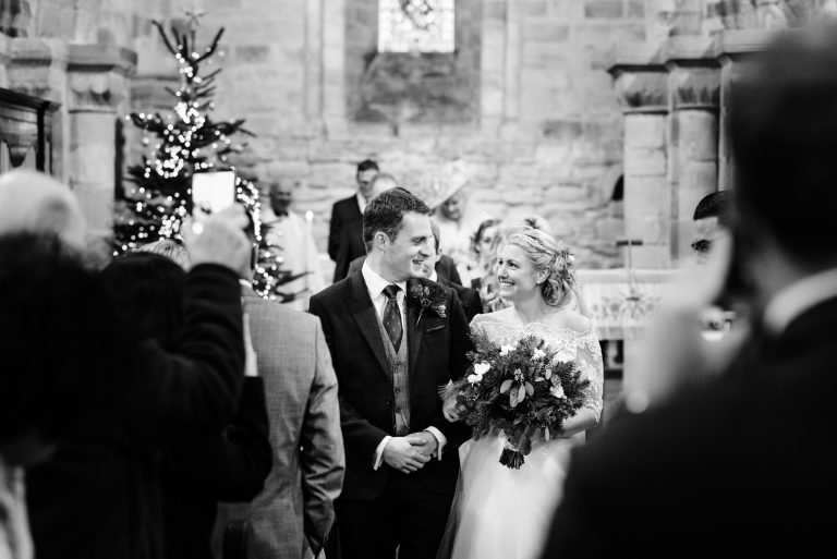 just married walking down the aisle