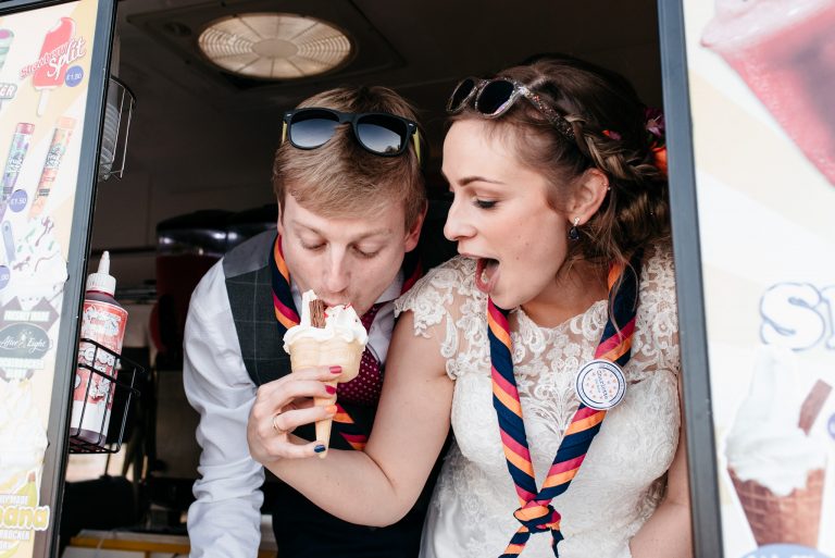 bride feeding groom ice cream cone