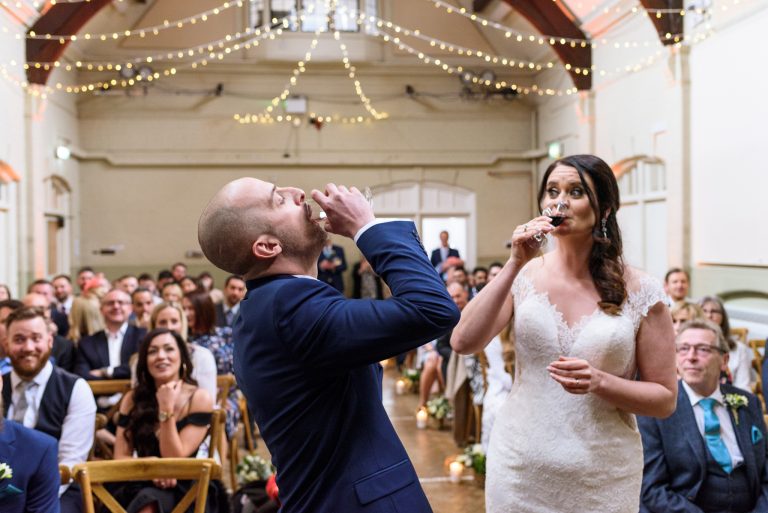 couple drink port during humanist ceremony