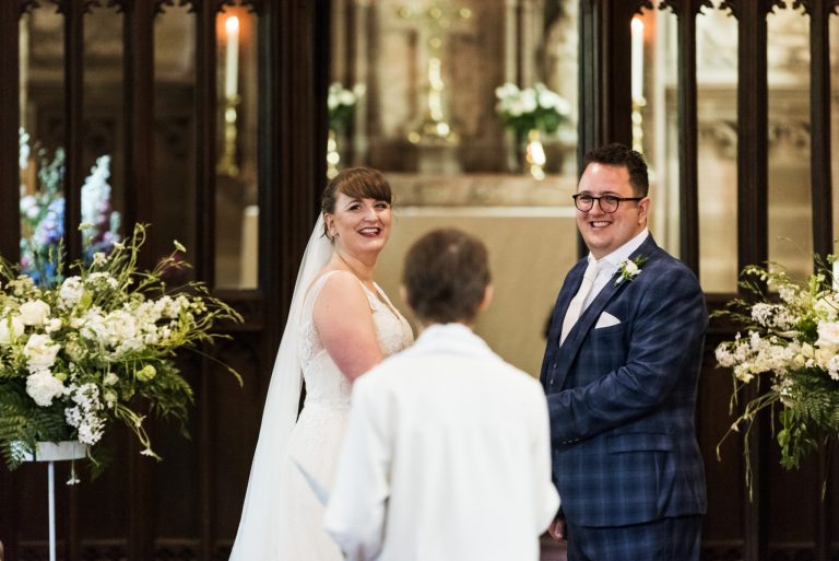 happy couple getting married in church