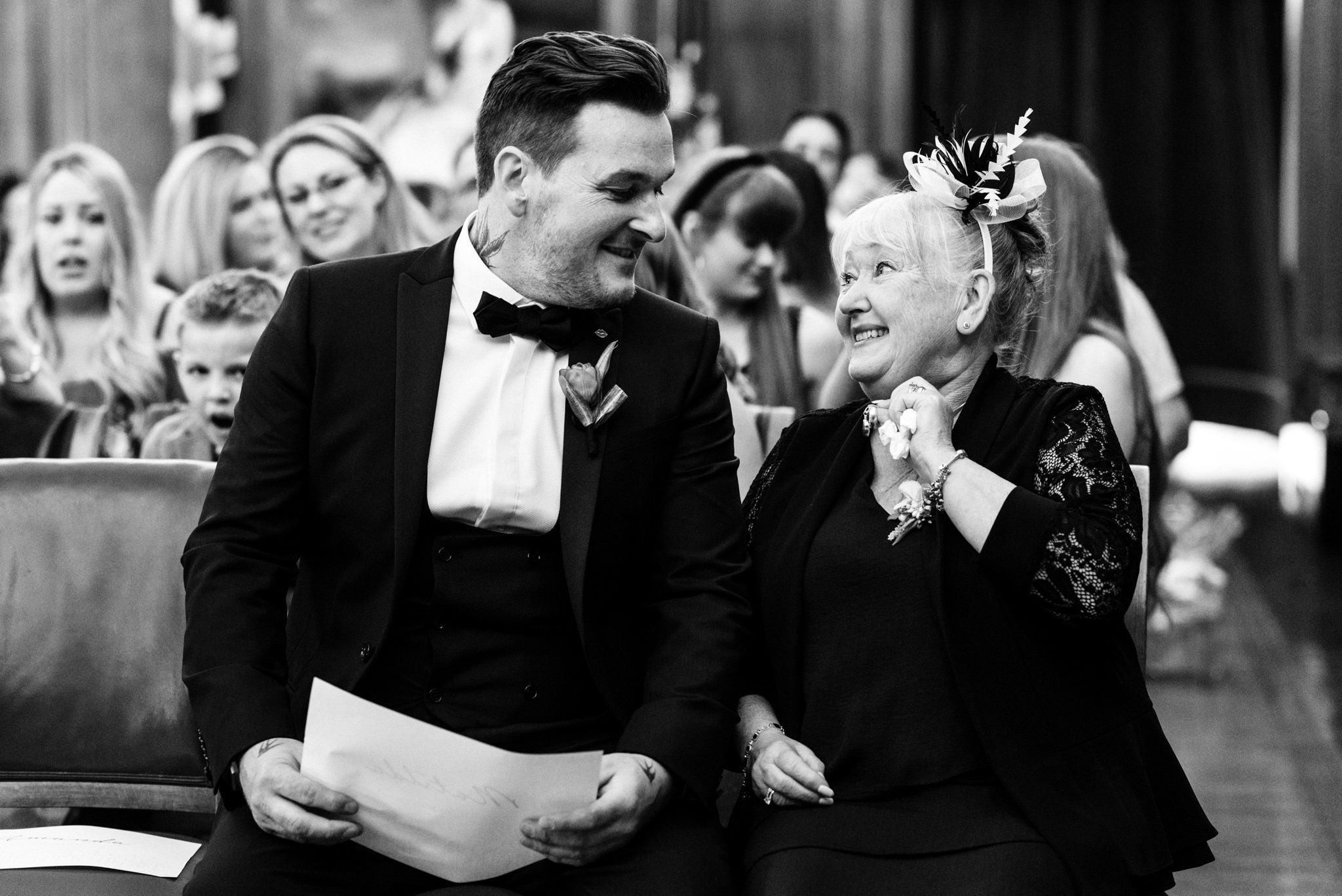 groom sat with his mum