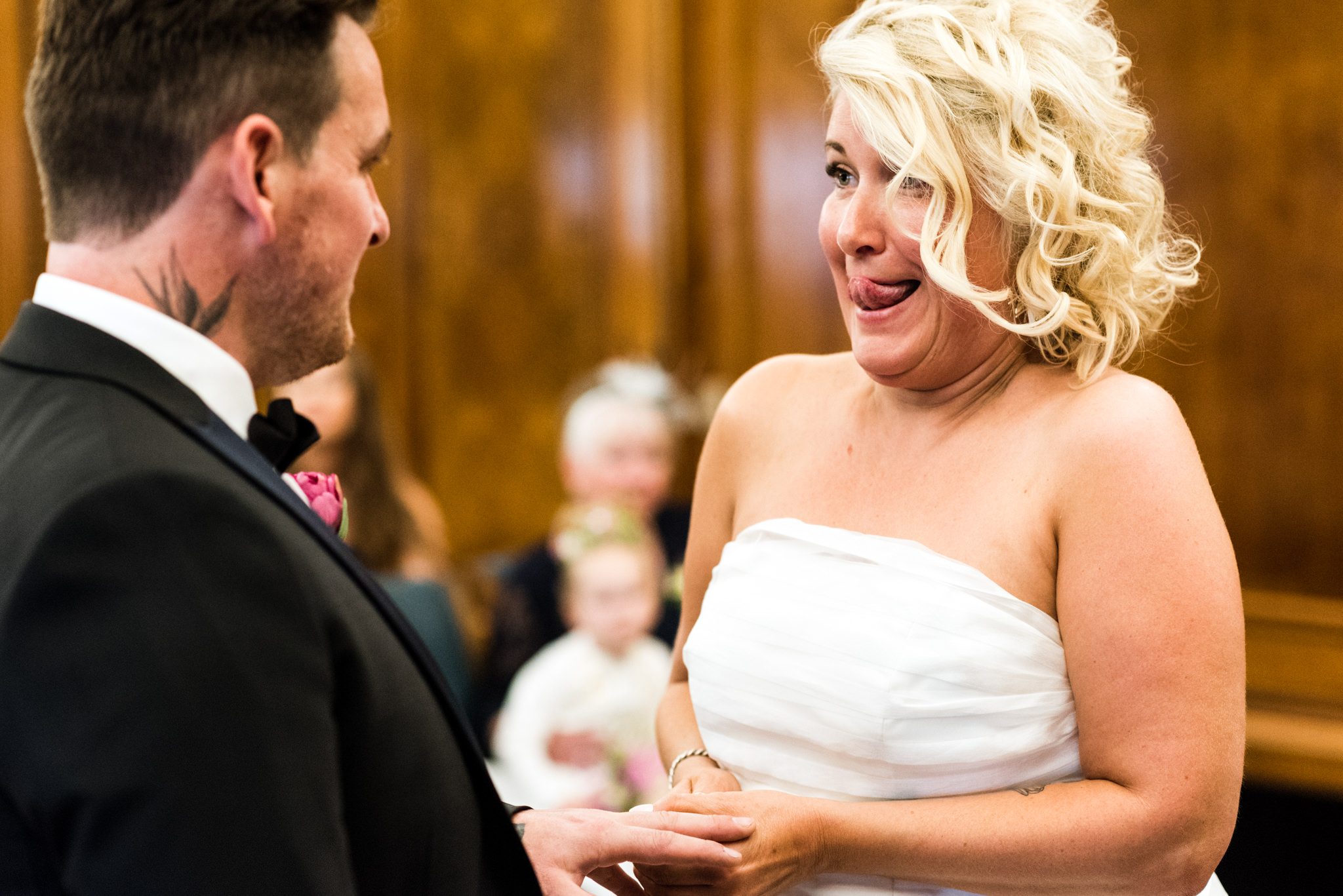 funny photo bride putting ring on